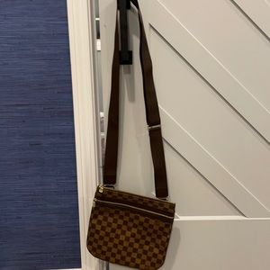 Authentic Louis Vuitton crossed shoulder bag